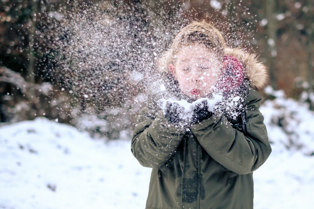 child playing in winter