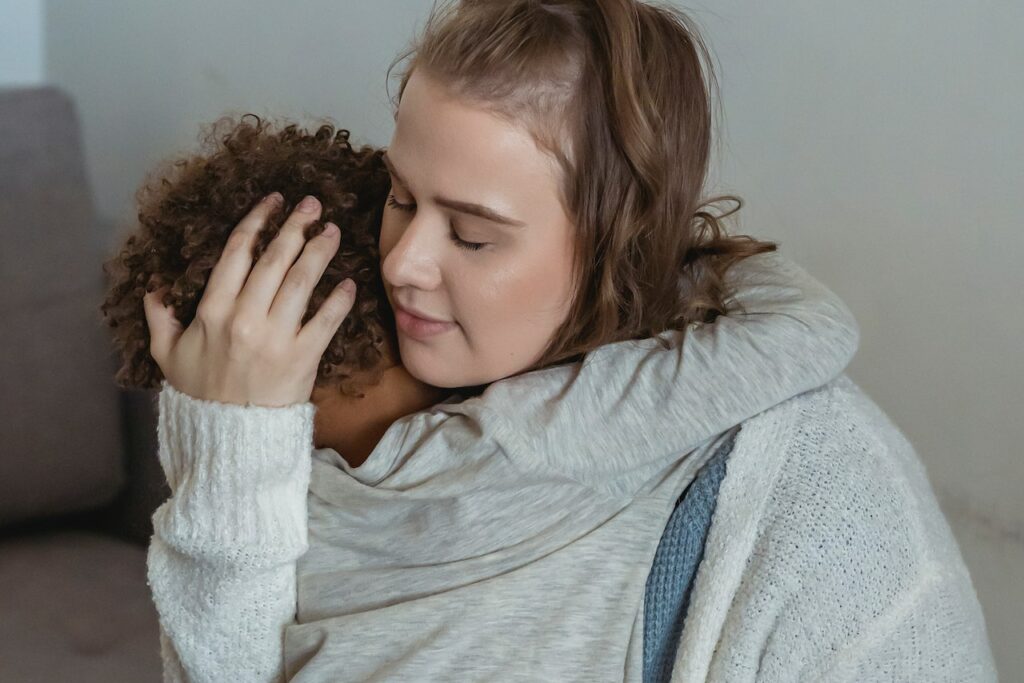 child hugging mother, pneumonia in children