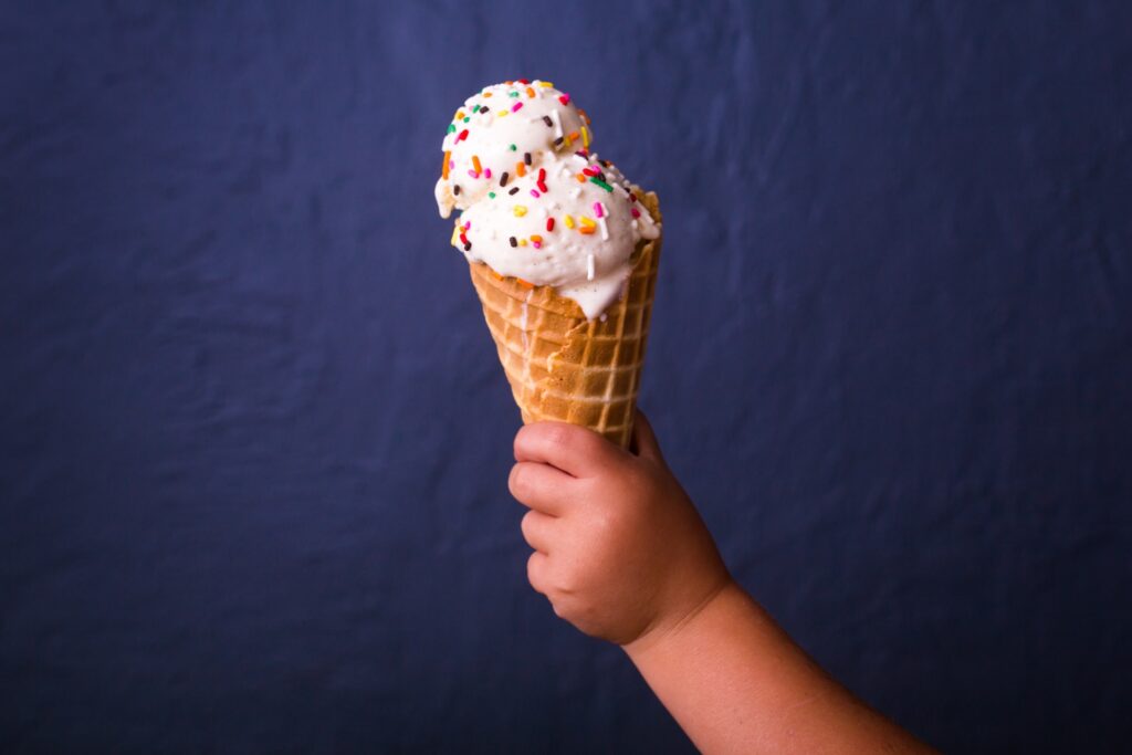child's hand holding ice cream, Childhood Obesity